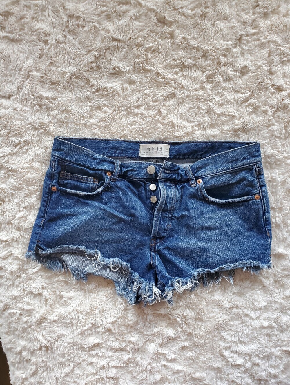 We The Free Dark Blue Distressed Denim Cutoff Shorts